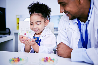 Buy stock photo Science, research and child with her father in the lab working on an experiment or test with sweets. Biology, candy and girl kid student doing project with dad scientist in pharmaceutical laboratory.