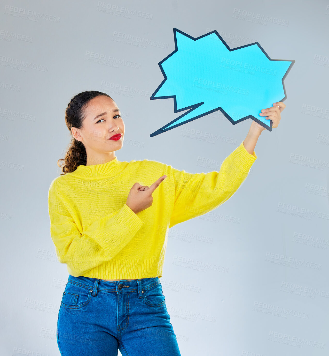 Buy stock photo Speech bubble, confused and woman pointing to chat, social media opinion and confused for translation in portrait. Gen z person with doubt, question and language mockup or quote on studio background