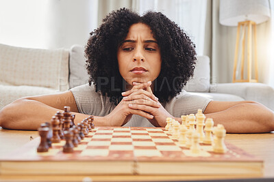 Buy stock photo Thinking, strategy and face of woman with chess for problem solving, planning and challenge at home. Competition, contest and female person with chessboard in living room ready for playing games