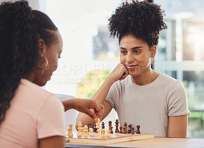 Buy stock photo Chess, game and women with board for thinking strategy and challenge friends in living room. Competition, planning and female people with chessboard playing for winning, checkmate and problem solving