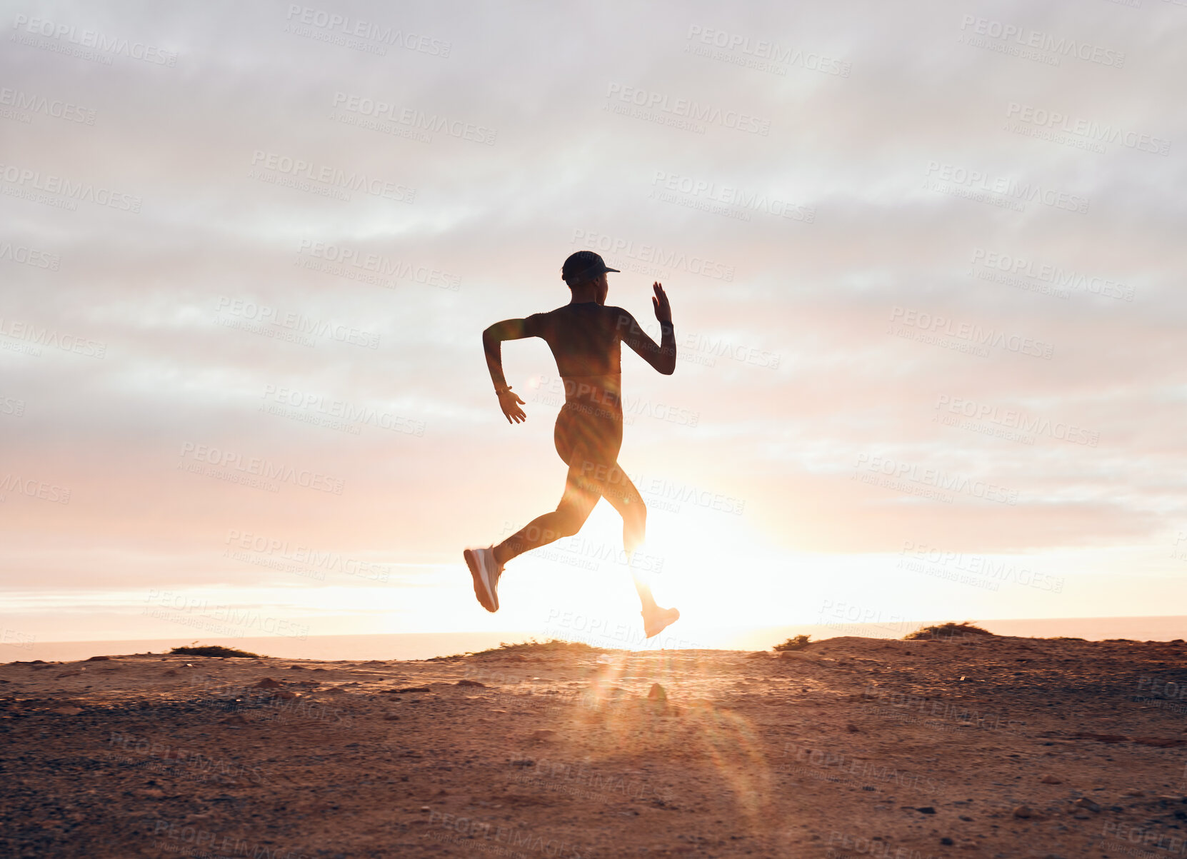 Buy stock photo Sunset, running and silhouette with woman in nature for health, workout and fitness challenge. Performance, sports and exercise with runner training in outdoor for speed, marathon and wellness mockup