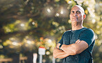 Man, outdoor and arms crossed portrait in a park for fitness, workout and athlete training. Male person, mature and wellness in nature with mockup and confidence in a forest for sport and health