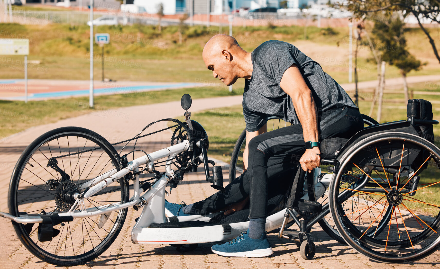 Buy stock photo Wheelchair, athlete or a man with a disability and bike for handicap race, fitness and recumbent challenge. Exercise, park and a handbike of paraplegic sports person outdoor for cardio and training