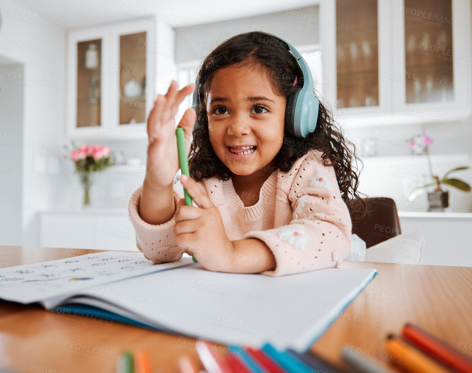 Buy stock photo Girl child, home and drawing with headphones, notebook or smile for homework, learning or study at desk. Kid, music and education with audio streaming, book or pen for writing, notes or happy in home