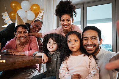 Buy stock photo Selfie of grandparents, parents and children at birthday in living room for party, celebration and social event. Family, love and portrait of mom, dad and kids in home with hats, balloon and smile