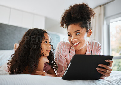 Buy stock photo Bed, relax and happy family kid with tablet for streaming child friendly video, morning entertainment or internet. Bedroom wellness rest, bond and home mother, daughter or people smile for online app