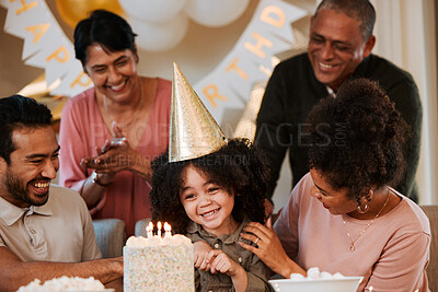 Buy stock photo Birthday, happy and parents with cake for child in living room for party, celebration and social event. Family, surprise and excited kid with dessert, snacks and sweet treats with candles at home