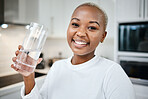 Portrait, glass and black woman drinking water, wellness and health with nutrition, funny or happiness. Face, female person or girl in her kitchen, liquid for energy or home with aqua, detox or smile