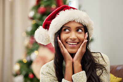 Buy stock photo Happy woman, face and thinking with Christmas hat by tree for festive season, celebration or gift surprise at home. Female person with smile in relax for holiday, weekend or December party in house