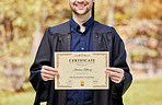 University, man and student with certificate in closeup with award at college for success in future. Graduation, man and diploma as achievement at university with education for masters in law.