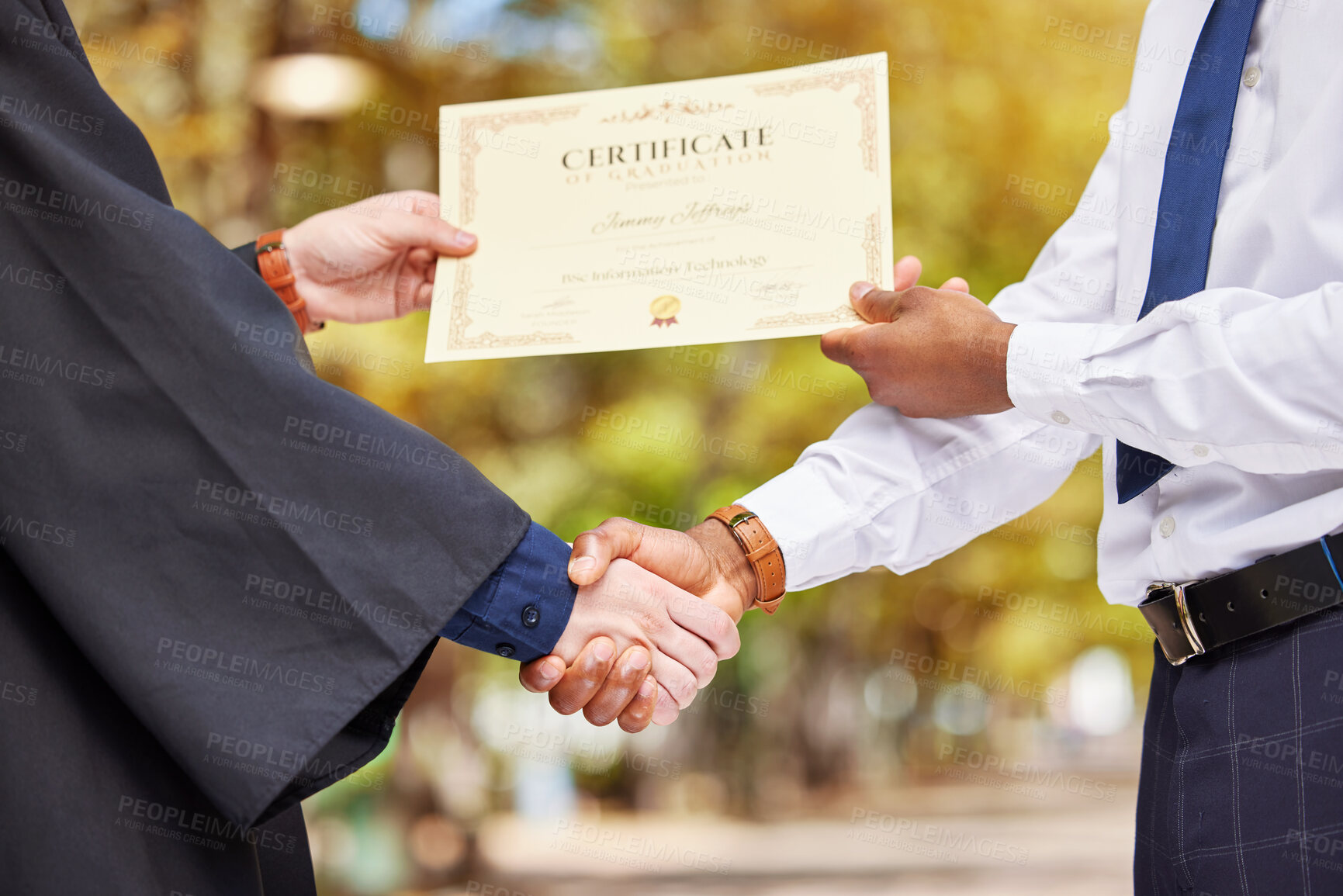 Buy stock photo Hand shake, graduation and certificate for college student with professor, congratulations and event for learning. Education, celebration and party with diploma, paperwork and people with success