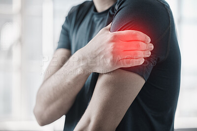 Buy stock photo Hand, shoulder pain and injury with the arm of a man in red highlight during a fitness workout. Healthcare, medical and emergency with a male athlete holding a joint after an accident in the gym