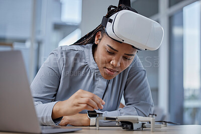 Buy stock photo Creative woman, VR and drone on desk for innovation, control or development at the office. Female person or hardware developer working on remote technology or virtual reality in startup at workplace