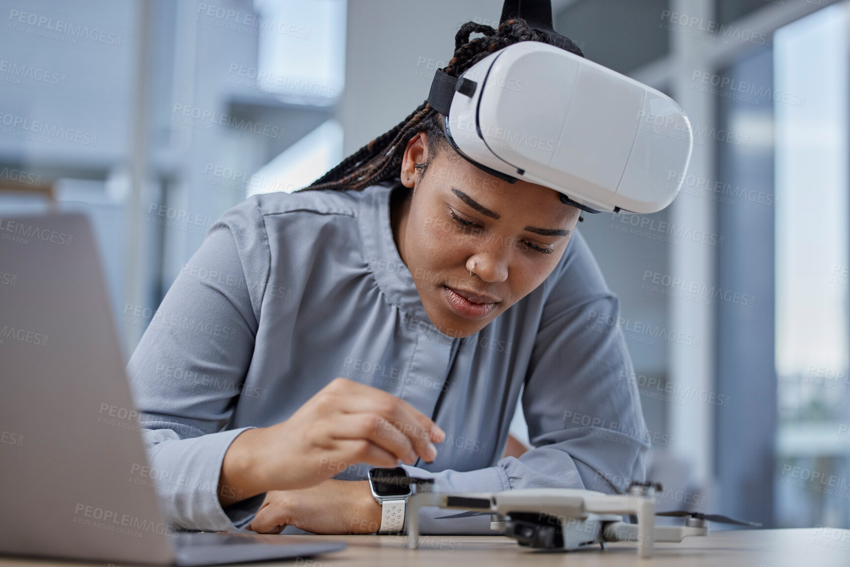 Buy stock photo Creative woman, VR and drone on desk for innovation, control or development at the office. Female person or hardware developer working on remote technology or virtual reality in startup at workplace