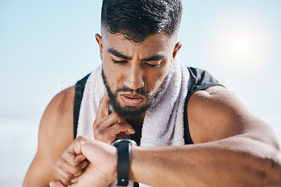 Buy stock photo Man, fitness and watch for pulse, heart rate or performance on break after workout, running or training. Fit, active and sporty male person checking wristwatch for monitoring body exercise in nature