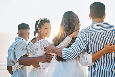 Buy stock photo Happy friends, back and hug on beach for sunset holiday, vacation or weekend together in nature. Rear view group of people standing for quality bonding time, trip or travel by the ocean coast outside