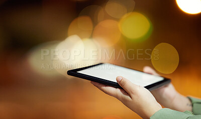 Buy stock photo Woman, hands and tablet with mockup screen at night in city for communication, networking or browsing. Hand of female person or freelancer working late with technology display in an urban town