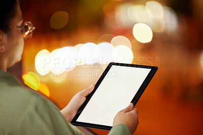 Buy stock photo Woman, hands and tablet with mockup at night in city for communication, networking or browsing outdoors. Hand of female person or freelancer working late with technology display in an urban town