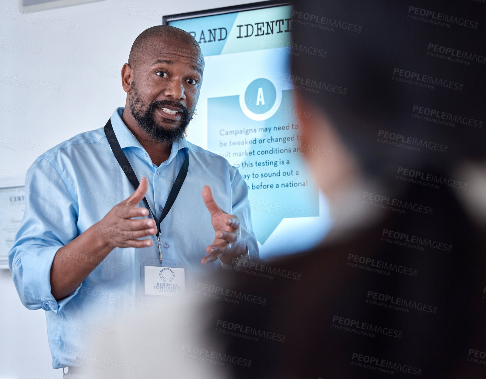 Buy stock photo Corporate, black man and leader with presentation, workshop and discussion with brand development. Male person, presenter and ceo with a vision, training and mentor with communication and education