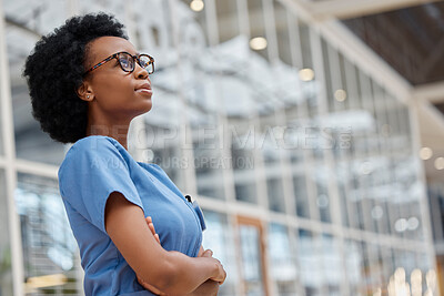 Buy stock photo Nurse, arms crossed and thinking with black woman in hospital for medical, idea and expert. Medicine, healthcare and nursing with female person in clinic for wellness, mockup space and surgery