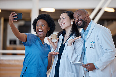 Buy stock photo Diversity, happy and group selfie of doctors, surgeon or emergency care workforce in hospital, clinic or medical facility. Asian woman, black woman nurse and African man smile for healthcare photo