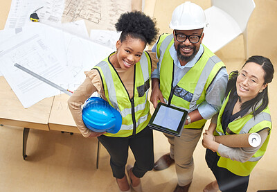 Buy stock photo Tablet, teamwork or portrait of engineers with designer planning a construction for architecture. Top view, blueprint or happy black people with Asian woman meeting together on a development project