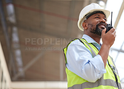 Buy stock photo Walkie talkie, black man and engineer planning, communication and construction. African architect, radio and happy contractor with industrial project, building maintenance and engineering discussion.