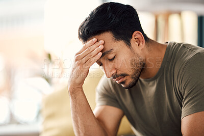 Buy stock photo Tired, headache and stress of man in living room with mental health, fatigue and sad problem. Face, depression and frustrated male person with anxiety, brain fog or crisis of failure, mistake or debt