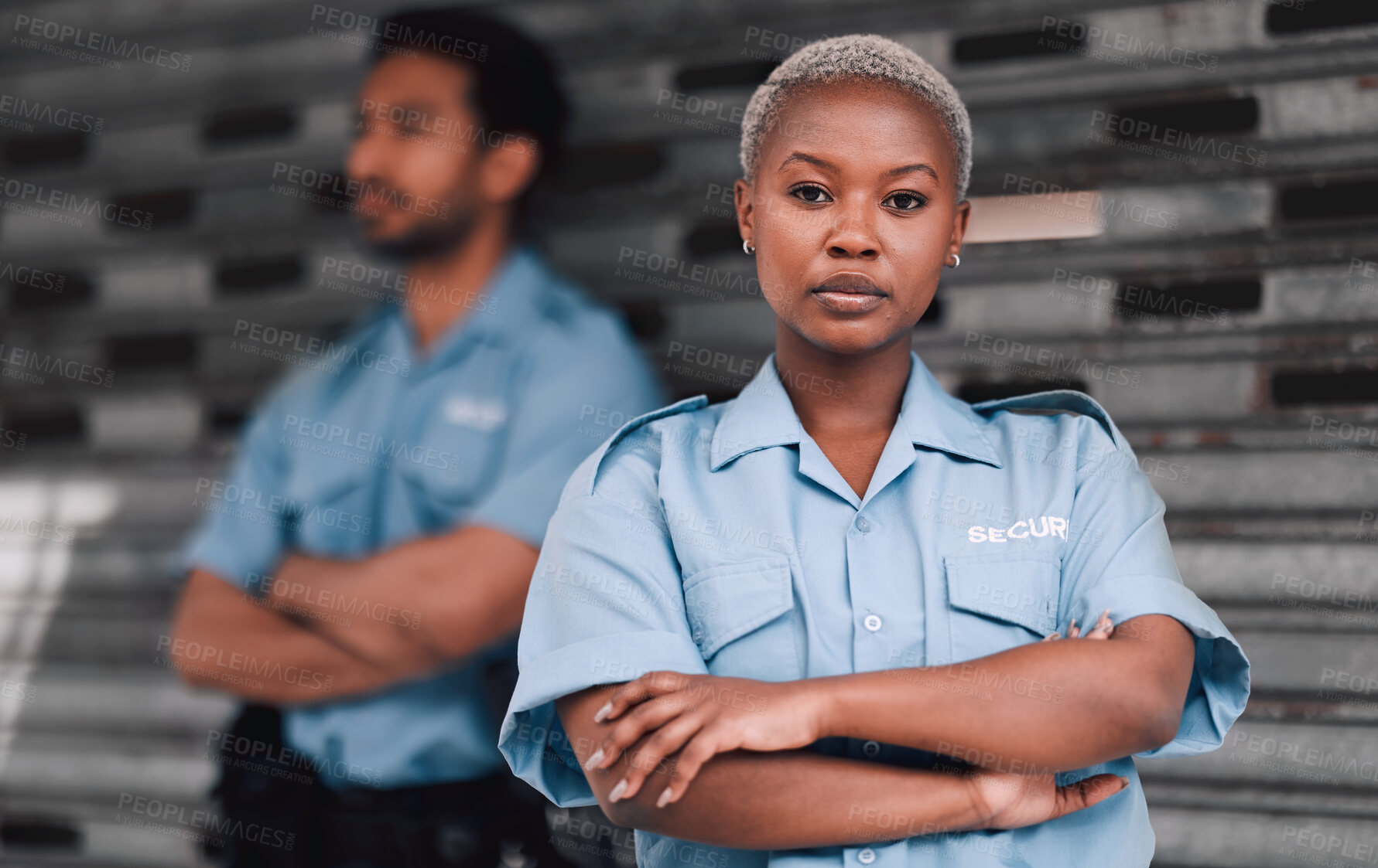 Buy stock photo Portrait, security or law enforcement and a serious woman arms crossed with a man colleague on the street. Safety. focus and duty with a crime prevention unity working as a team in an urban city