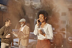 Phone call, coffee and a business black woman in the city for communication on her morning commute. Mobile, contact and travel with a happy young female employee walking outdoor in an urban town