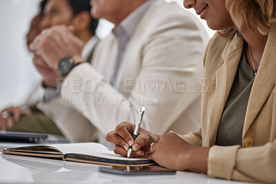 Buy stock photo Woman, hands and writing in book for meeting notes, information or minutes on office desk in boardroom. Hand of female person or employee in team planning, strategy or brainstorming in notebook