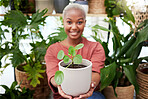 Black woman, plant and nature, gardening and sustainability with environment. African female person, eco friendly and smile in portrait, happy with botany and green leaves, sprout in soil with growth