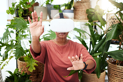 Buy stock photo Woman, virtual reality and headset with hands at home for metaverse, 3d world or future. Black person with plants and vr glasses for ecology, ai and touch for interaction, video game or experience