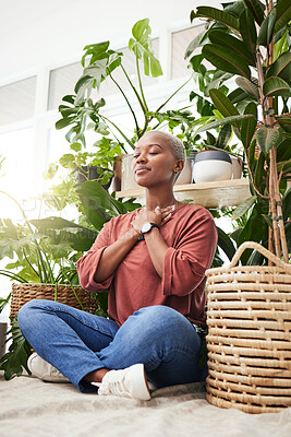 Buy stock photo Wellness, peace and woman breathing by plants for meditation in a natural greenhouse. Breathe, gratitude and young calm African female person with a relaxing zen mindset by an indoor nursery garden.
