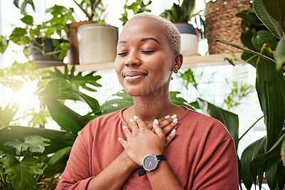 Buy stock photo Balance, breathing and young woman by plants for zen meditation in a greenery nursery. Breathe, gratitude and young African female person with a relaxing peace mindset by an indoor greenhouse garden.