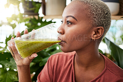 Buy stock photo Black woman, diet and drinking natural smoothie for vitamins, fiber or health and wellness in store. Face of African female person with healthy beverage, drink or organic fruit juice to lose weight