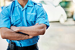Security guard, safety officer and man with arms crossed outdoor on street for protection and patrol. Law enforcement, confident and duty with a crime prevention male worker in uniform in the city