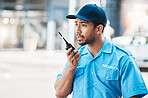 Security guard, communication and officer use a walkie talkie or radio for an emergency or criminal investigation. Protection, safety and police talking in a law enforcement service office for crime