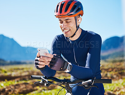 Buy stock photo Cycling, break or happy man with phone on social media for sports, training or fitness workout content. Smile, bicycle or male cyclist resting with mobile app for networking, browsing or searching 
