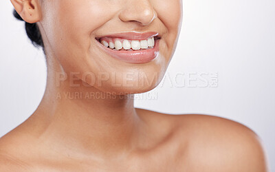 Buy stock photo Closeup, mouth and woman with skincare, dermatology and grooming against a white studio background. Zoom, female person and model with a smile, lips and smooth skin with a glow, shine and dental care