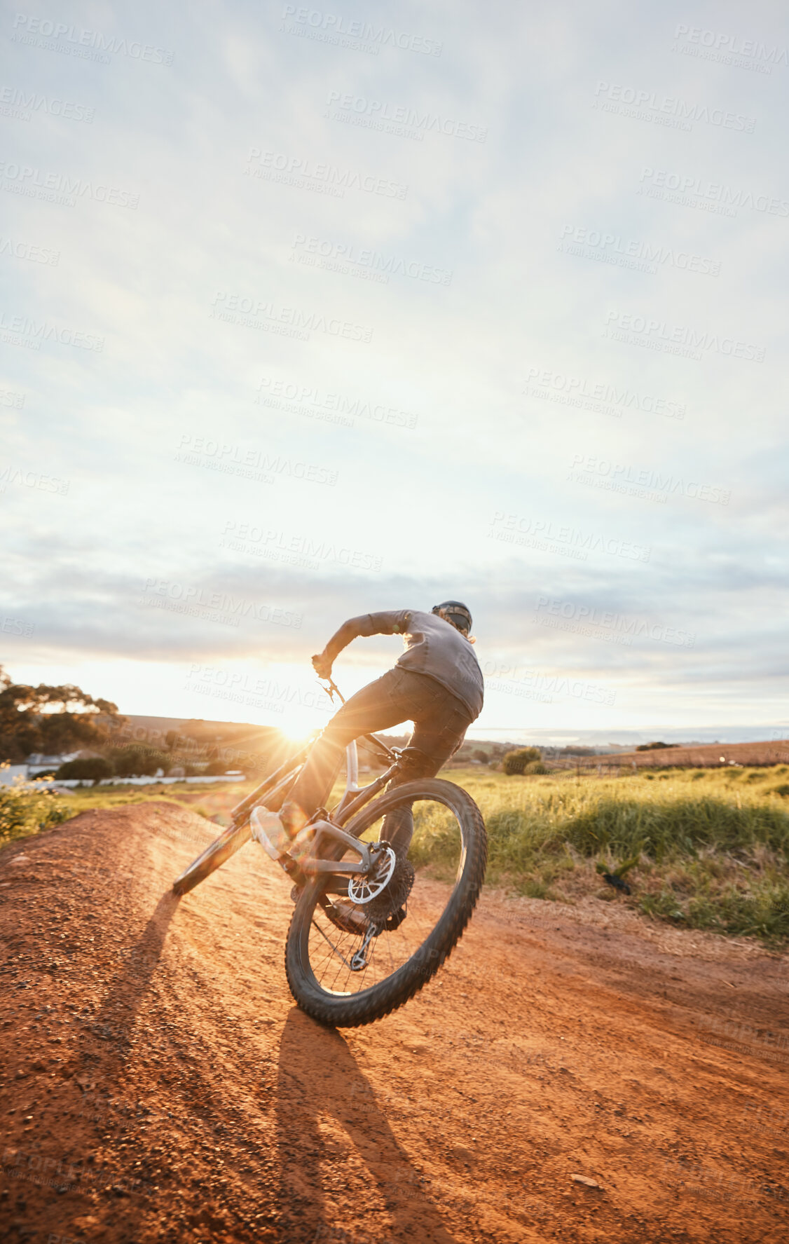 Buy stock photo Sports, morning and man of bicycle in nature for training, workout and exercise in countryside. Fitness, cycling and male person with mountain bike for adventure, freedom and adrenaline on dirt road