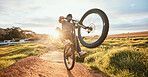 Sports, adrenaline and man of bicycle in nature for training, workout and exercise in countryside. Fitness, cycling and male person with mountain bike for adventure, freedom and speed on dirt road