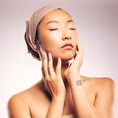 Buy stock photo Asian woman, beauty and skincare in studio for makeup, glow, soft touch and cosmetic results by background. Japanese model, girl and eyes closed for wellness, aesthetic and change for skin health