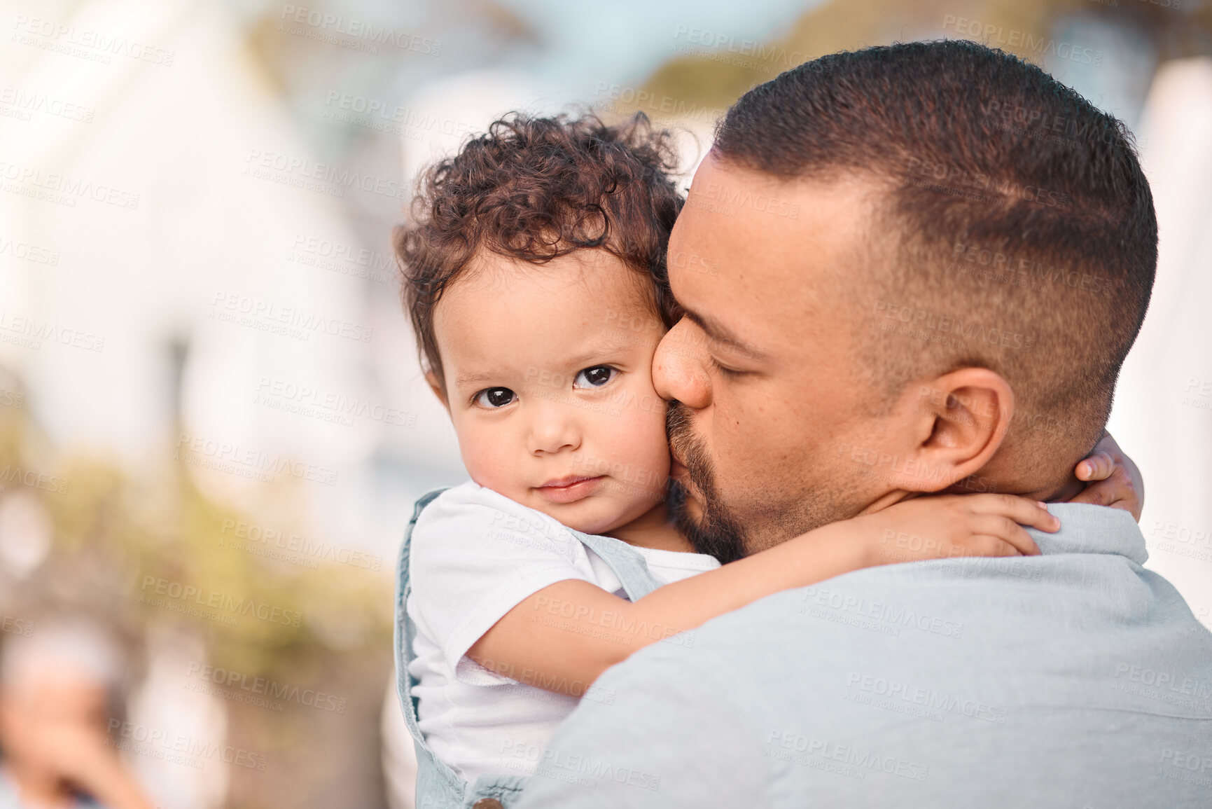 Buy stock photo Love, dad and child hug, kiss and family bonding, support and trust in safety of parents embrace. Security, future hope and father with baby outside, hugging and spending safe quality time together.