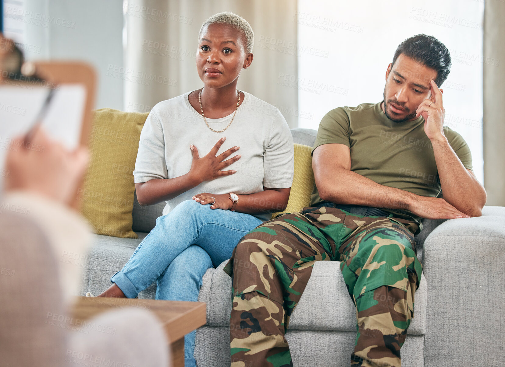 Buy stock photo Divorce, therapy and couple on a couch, argument or stress with anxiety, fighting or relationship stress. Marriage problem, black woman or Asian man on a sofa, counselling or frustrated with conflict