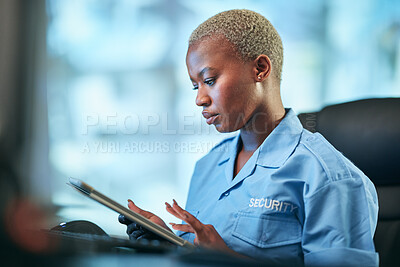 Buy stock photo Security, working and black woman with tablet at a desk for communication, cctv app or building monitor. Digital, reading and an African safety officer typing on technology for a surveillance system