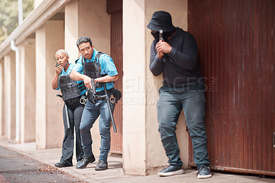 Buy stock photo Police, crime and gun with criminal in outdoor for security with law enforcement at house. Security, man and robber with weapon with investigation on duty together in driveway for justice with cop.