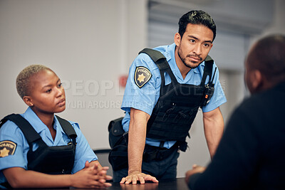 Buy stock photo Interrogation, arrest and police team with a suspect for questions as law enforcement officers. Security, crime or investigation with a serious man and woman cop talking to a witness for information