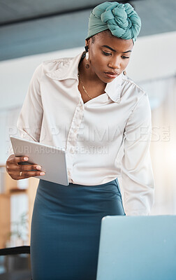 Buy stock photo Black woman, business and working on laptop, tablet and research online website in law firm. Attorney, lawyer and serious female employee search on digital technology, computer and legal data report
