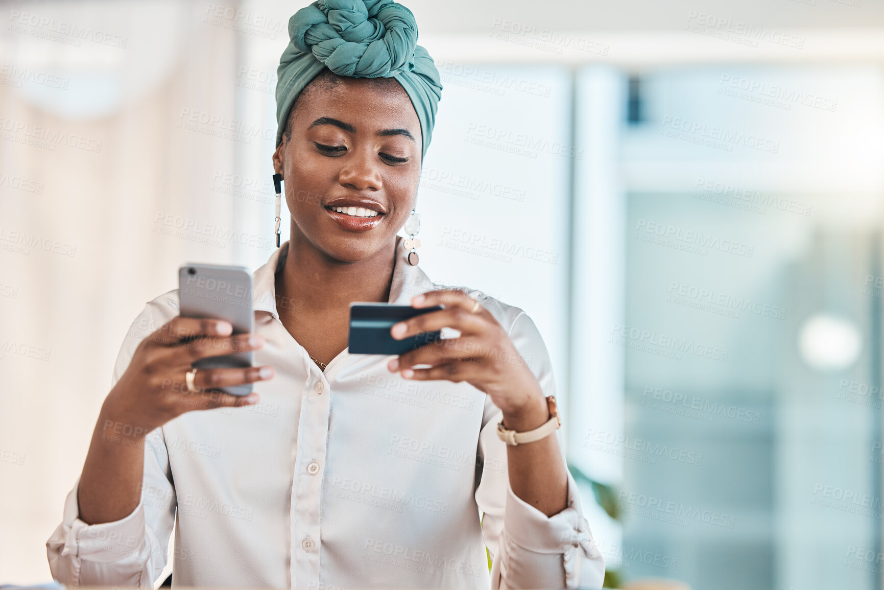 Buy stock photo Work, online shopping and a black woman with a credit card and phone for ecommerce or banking. Happy, finance and an African girl or employee making a payment on a mobile app from the office